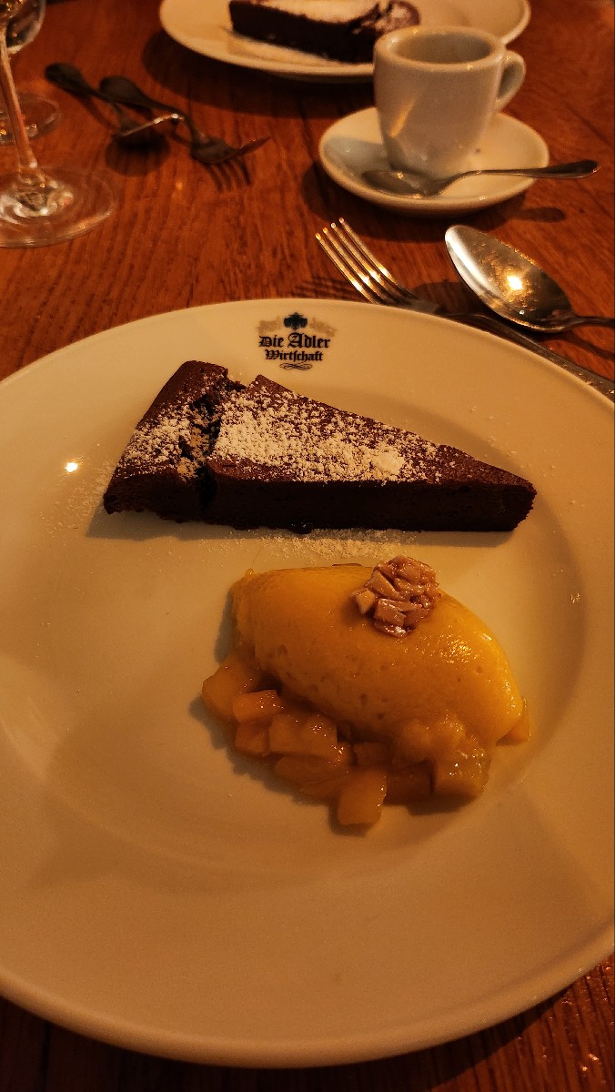Valrhona "Guanaja" chocolate tart with mango sorbet